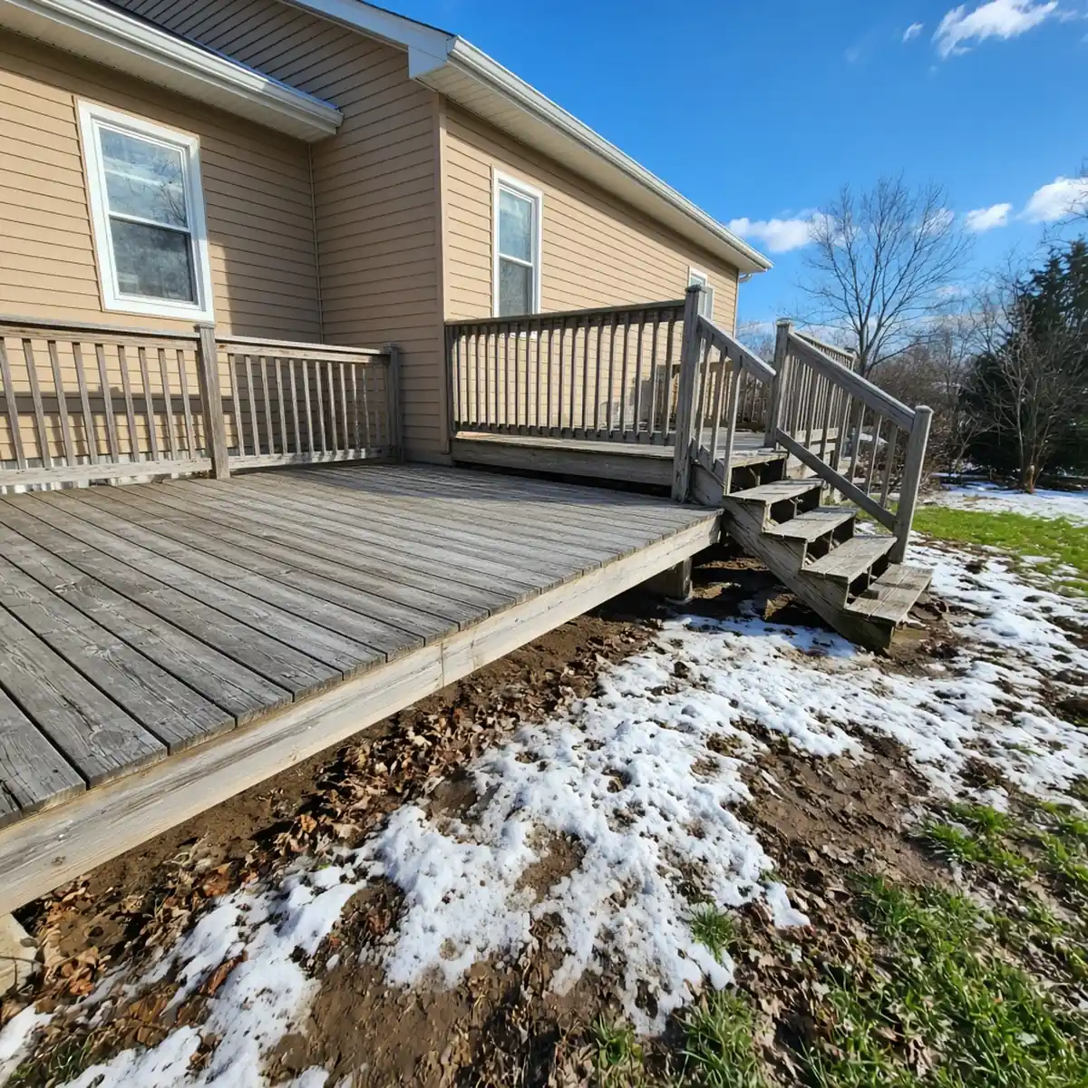 Deck visibly heaved and racked out of level after a Minnesota winter